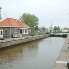 Schotbalkenloods bij Ir. De Kock van Leeuwensluis, sluiswachtersonderkomen