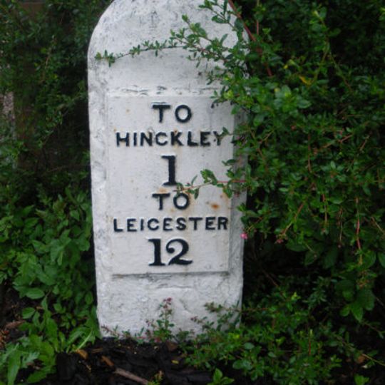 Milestone, entrance to Milestone House, opp entrance to golf club