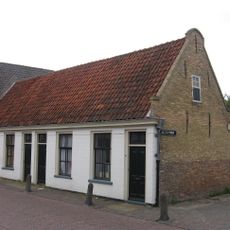 Eenvoudig pand onder zadeldak