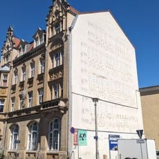 Wohn- und Geschäftshaus in halboffener Bebauung konzipiert Bahnhofstraße 6a