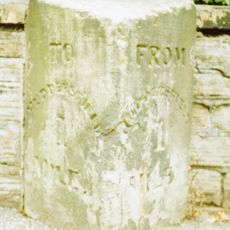 Milestone, Bradford Road, Fartown, outside No. 246 , nr Olive Street. Opp Dreamers Store
