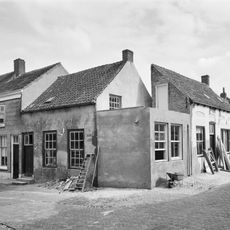 Gepleisterd verdiepingloos dwarspand