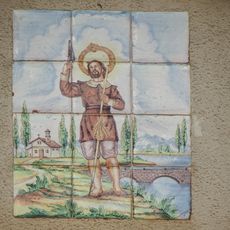 Ceramic panel of Saint Isidore at 46 Fra Lluía Amigó street