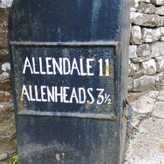 Cowshill where main road forks right, at jct with UC road