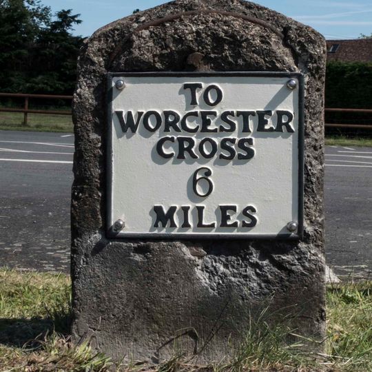 Milestone, Court Farm, by Bant's pub
