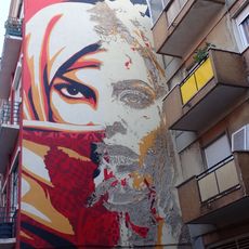 Mural by Shepard Fairey & Vhils in Lisbon