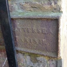 Boundary Wall Between Number 37 And Elf Filling Station Bearing Twin Plates (Fixed To East And West Sides)