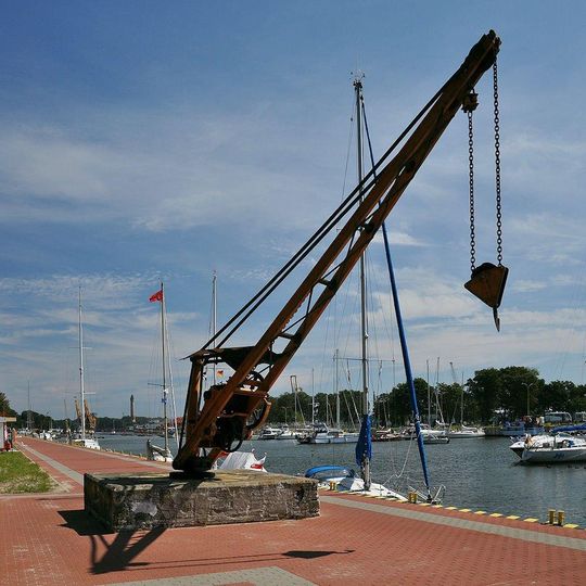 Northern basin wharfs and crane at former shipyard in Świnoujście
