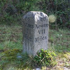 Milestone, opp. jct of road to The Bourtons & Newton Road Cottages