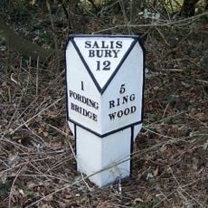 Milepost, Bickton; 250m S crossroads,