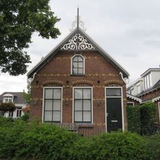 Vier woningen in Overgangsstijl