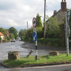 Cross Base Approximately 1/2 Metre West Of Road Verge
