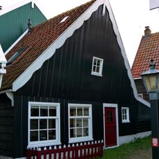 Perceelsgedeelte van een houten huis