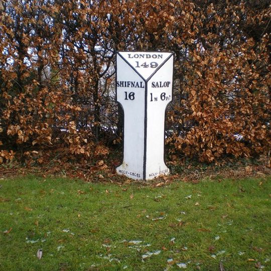 Milepost, London Road; by Emstrey Cemetery