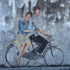 Boy and Girl on Bicycle