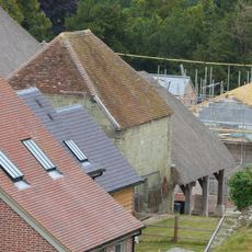 Dovecote and attached open shelter building 60m south-west Of Church Farmhouse