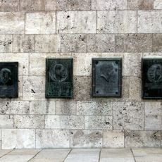 7 bronze plaques with portrait reliefs
