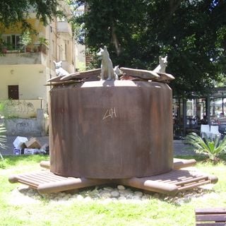 A Well and Four Dogs