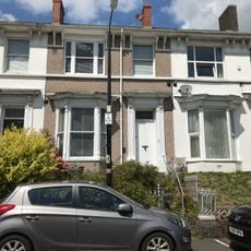 No 3 including front wall, railings and gate.