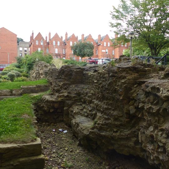 Roman wall, ditch and gate adjoining and under The Park