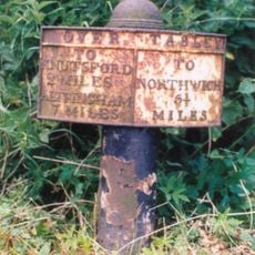 Milepost, S of Yewtree House, at jct with A5033