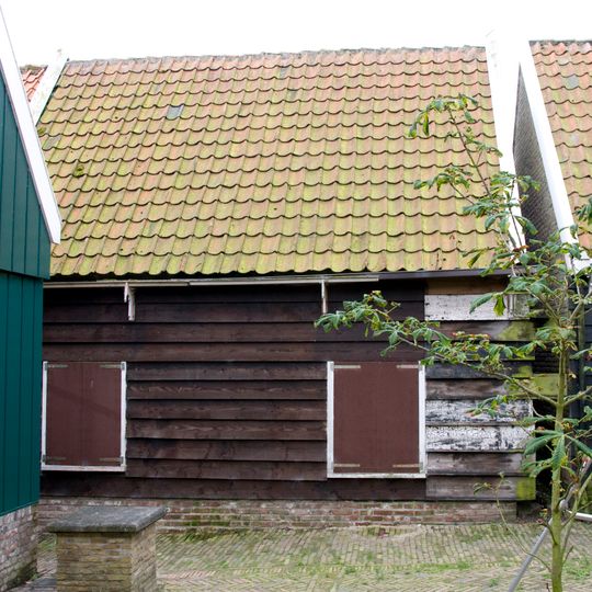 Perceelsgedeelte van een houten huis