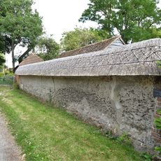 Cob Wall approximately 20 metres south west of numbers 1 and 2 Aston Street