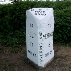 Milepost, c.1/5 mile N of Cherry Tree Farm, between tel. poles 5 & 6