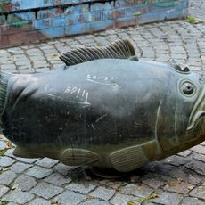 Sculptures boy, fish, frog