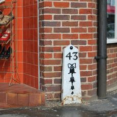 Milepost, High Street jct with Bell Lane, at traffic lights