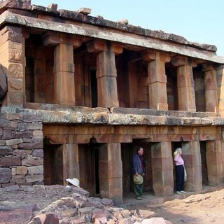 Two storeyed Jaina temple and cave at Meguti hill