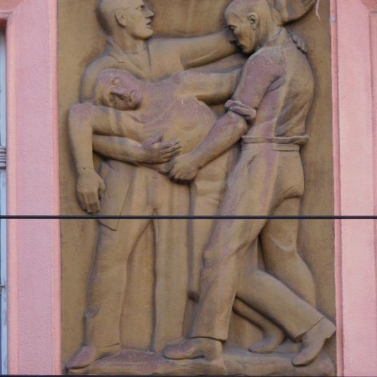 Reliefs at Senovážné náměstí 22