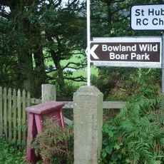 Milestone at SD 657 499, approximately 150 metres south east of school