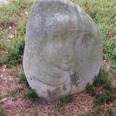 Sandstone sculpture in Dendrological garden