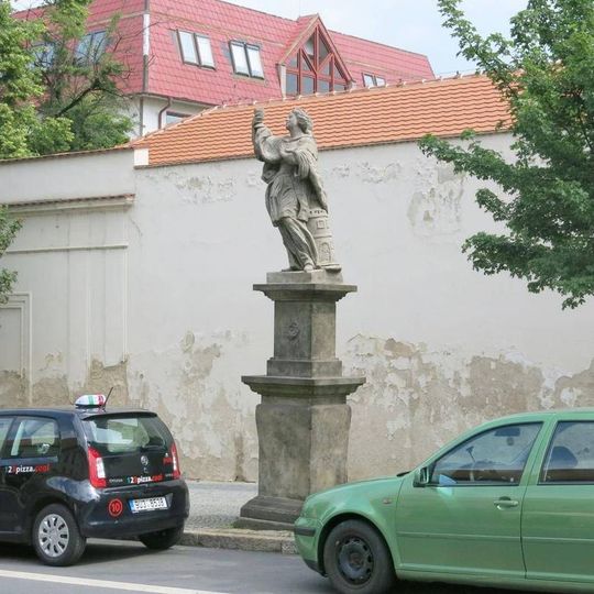 Socha svaté Barbory před Kapucínským klášterem v Žatci