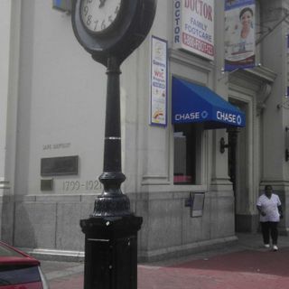 Sidewalk clock on Jamaica Avenue