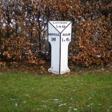 Milepost, London Road; by Emstrey Cemetery