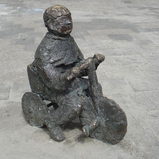 Kleuter op driewieler