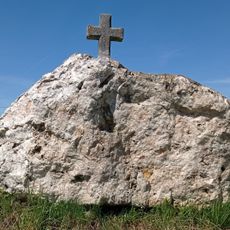 Wayside cross on a stone