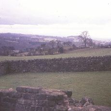 Hadrian's Wall and vallum between the field boundary west of Coombe Crag and Banks Green Cottage and the road to Lanercost at Banks in wall miles 51 and 52
