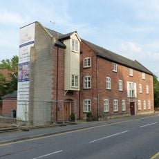Section of warehouses occupied by Wherry and Sons to the south of the carriage archway