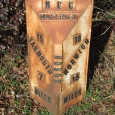 Milepost, 10m W of jct with Ruggs Lane, Burgh St Margaret