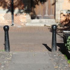 3 bollards on north side of churchyard