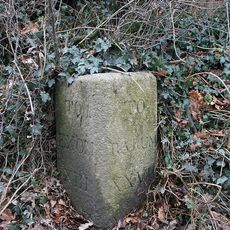 Milestone, N end of Copplestone, close to Norton Farm
