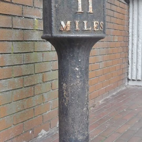 Milepost, by side of No. 65 Green Lane, nr Gower Street jct