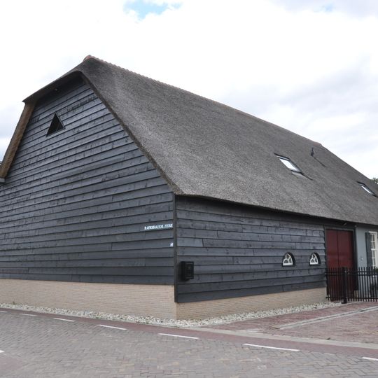 Overkluizing van de deels nog bestaande Ree- en Meervliet ter plaatse van de Bloemendaalse Zeedijk met daarboven een woonhuis en bedrijfsgedeelte