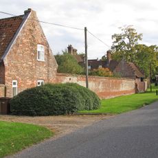 Cottage Attached To North Of Garden Wall