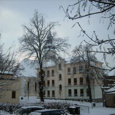Ehemalige Schule (östlicher Flügel einer U-förmigen Schulanlage) Kirchplatz 4