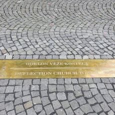 Deska odklonu věže kostela Nanebevzetí Panny Marie v Ústí nad Labem