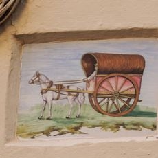 Ceramic panel of a Tartane at 18 Norberto Piñango street